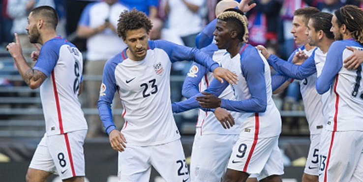 United States celebrating a 2016 Quarter Final goal against Ecuador