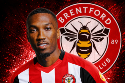 Jaidon Anthony wearing a Brentford FC home kit with a large Brentford club crest on a red and black graphic background.